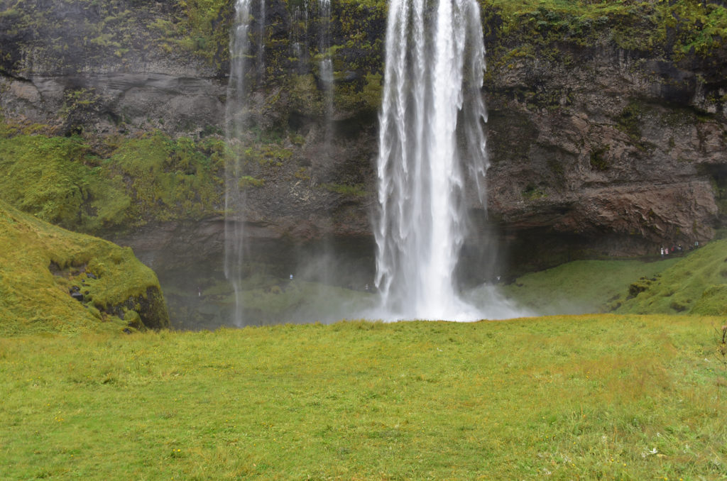 Walking behind the waterfall