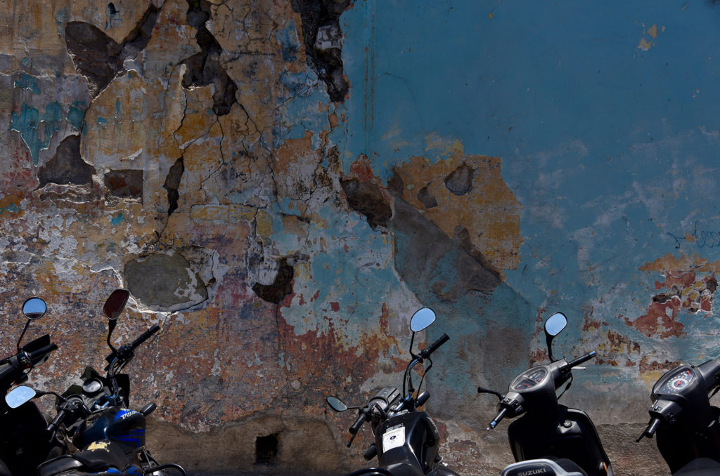 Motorcycles-and-old-wall