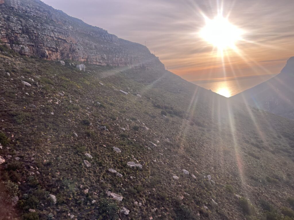 On a cable car partway up to the top of Table Mountain